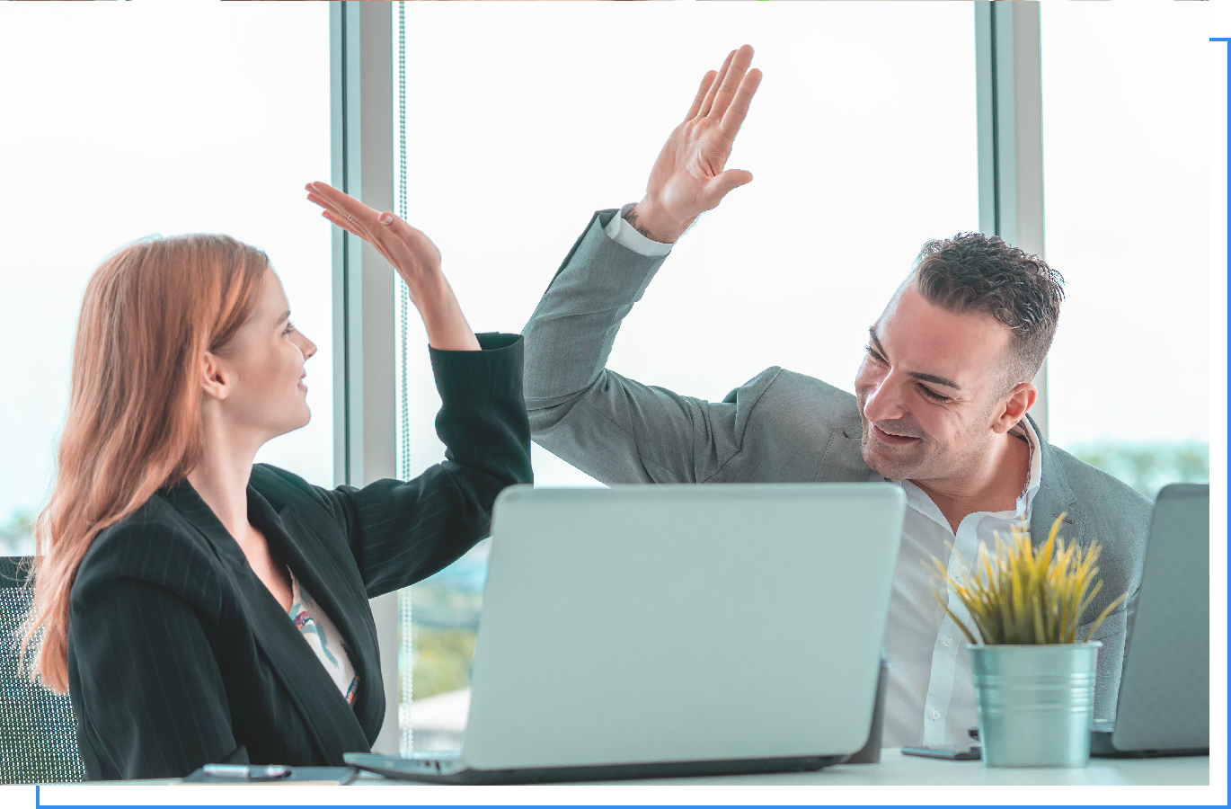 Happy Colleagues doing a Hi 5